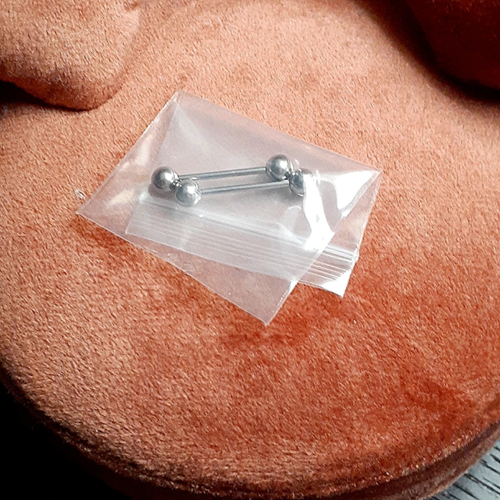 Double bars body piercing